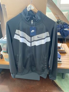 Nike Men’s Black Track Jacket with White Chevron Stripes